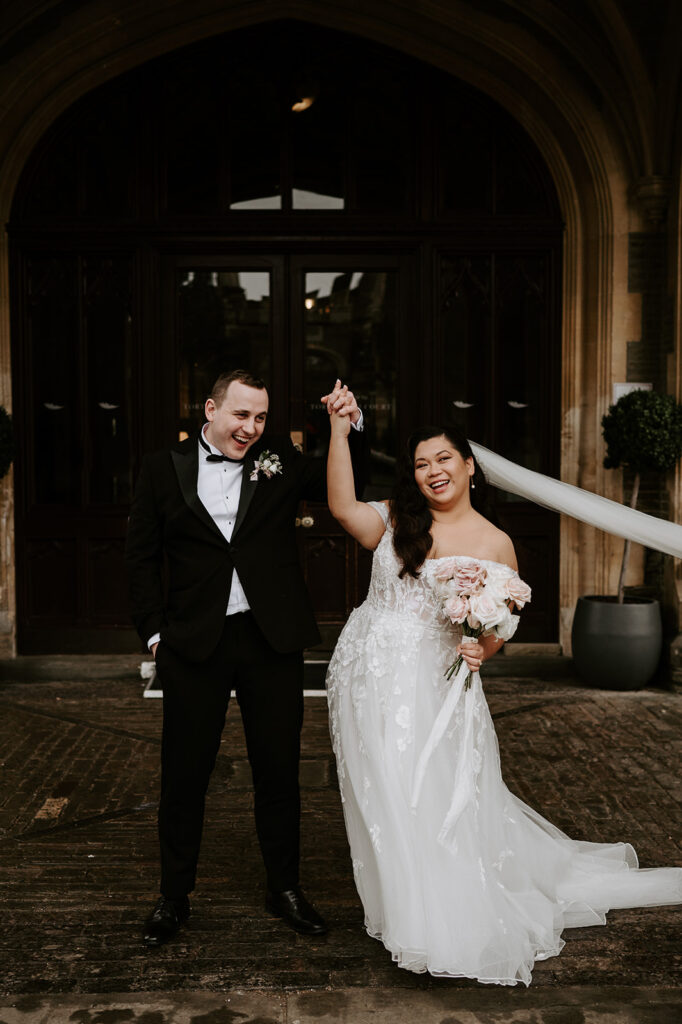 bride and groom cheering