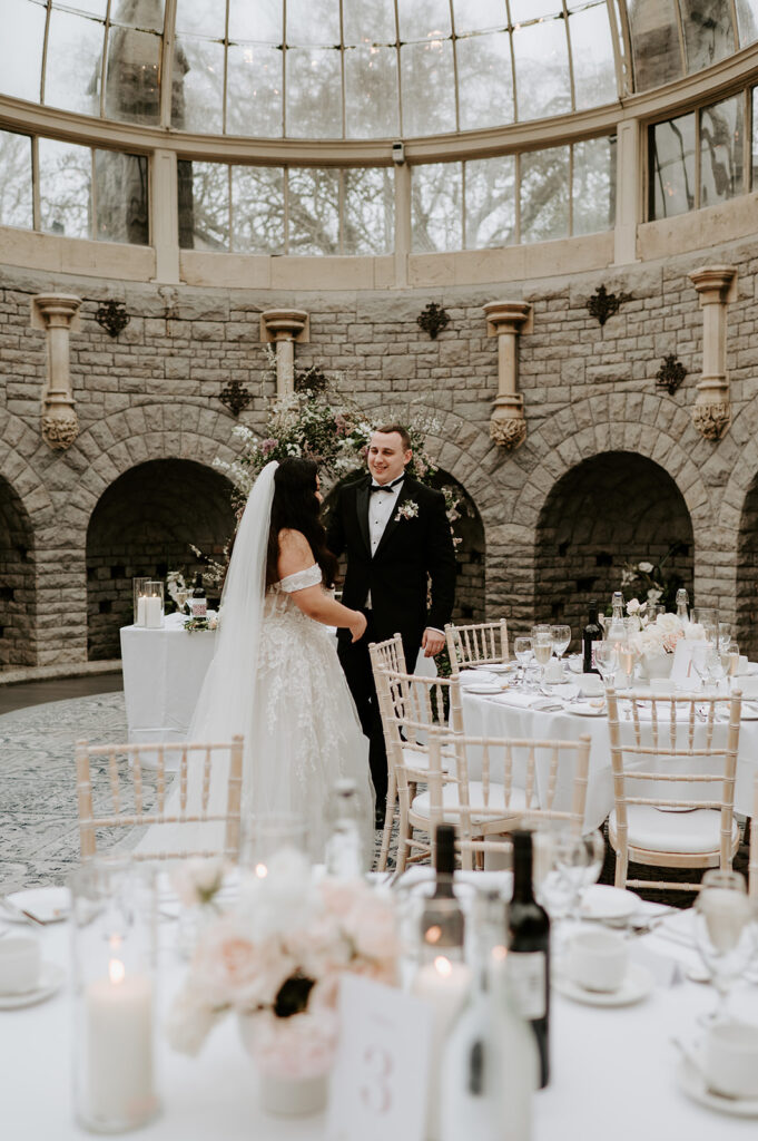 bride and groom in reception room