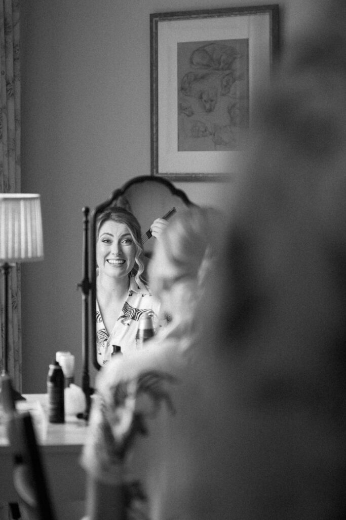 Bride Smiling During Bridal Prep at Bruisyard Hall