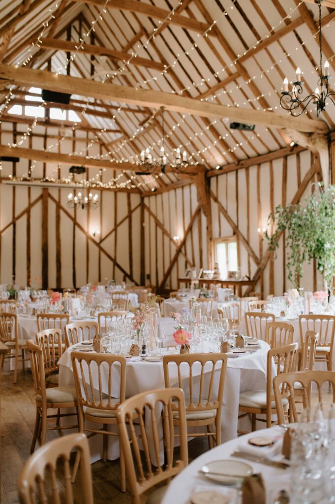 Beautifully styled wedding breakfast room ready for guests at Bruisyard Hall