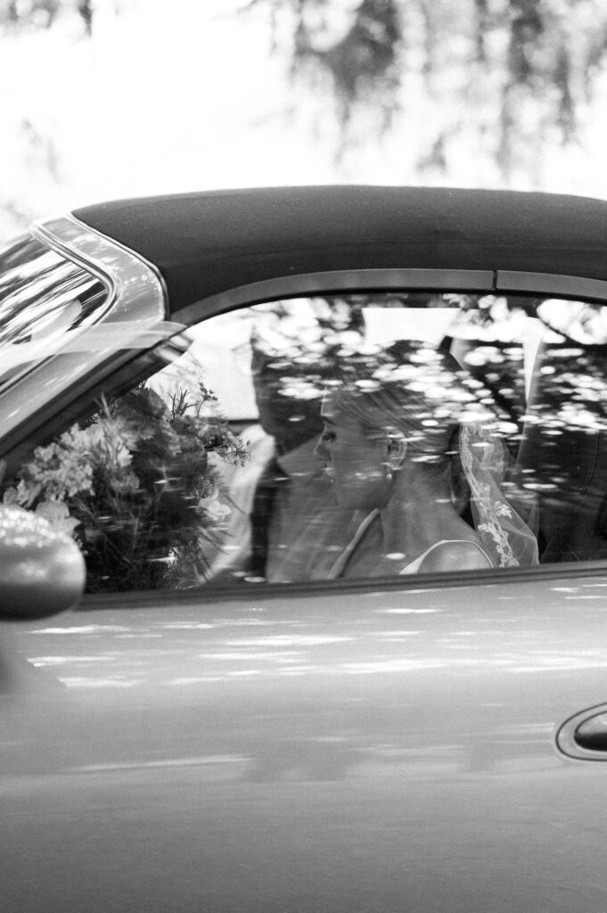 Bride arriving in car at church
