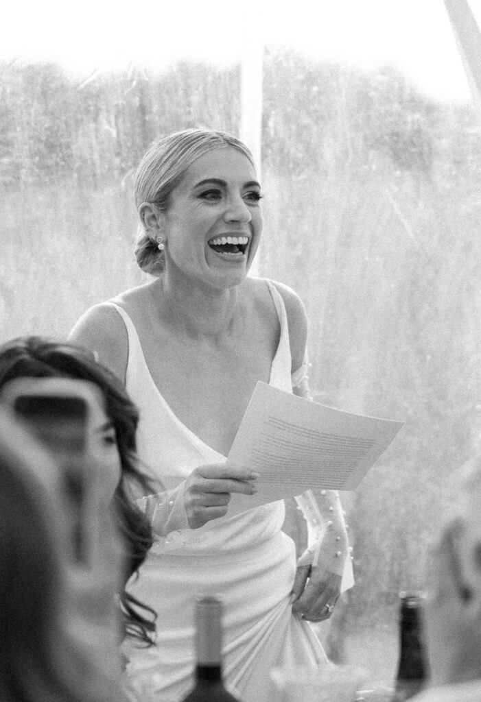 bride making speech at marquee wedding in suffolk